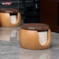 Two lidded filter boxes on a grey marble floor, filters visible through the notches, a grinder behind