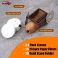 Snail-Set auf grauem Marmor ausgelegt, mit Beschriftungen für Puck Screens, Papierfilterstapel und Snail-Halter