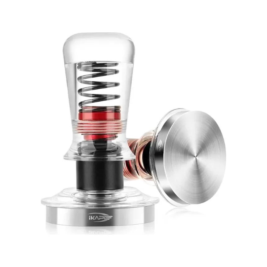 IKAPE V3 Tamper Acryl, transparent: einer aufrecht mit der Feder im klaren Griff, einer liegend mit sichtbarer Basis
