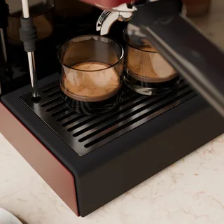 Espressogläser auf dem Edelstahlgitter von oben, das OPV-Rohr in seinem Loch, in der Küche