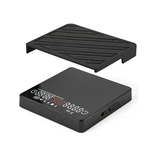 IKAPE SC35 Kaffeewaage Mini mit Timer in Schwarz, die geriffelte Silikonmatte über dem beleuchteten Display angehoben